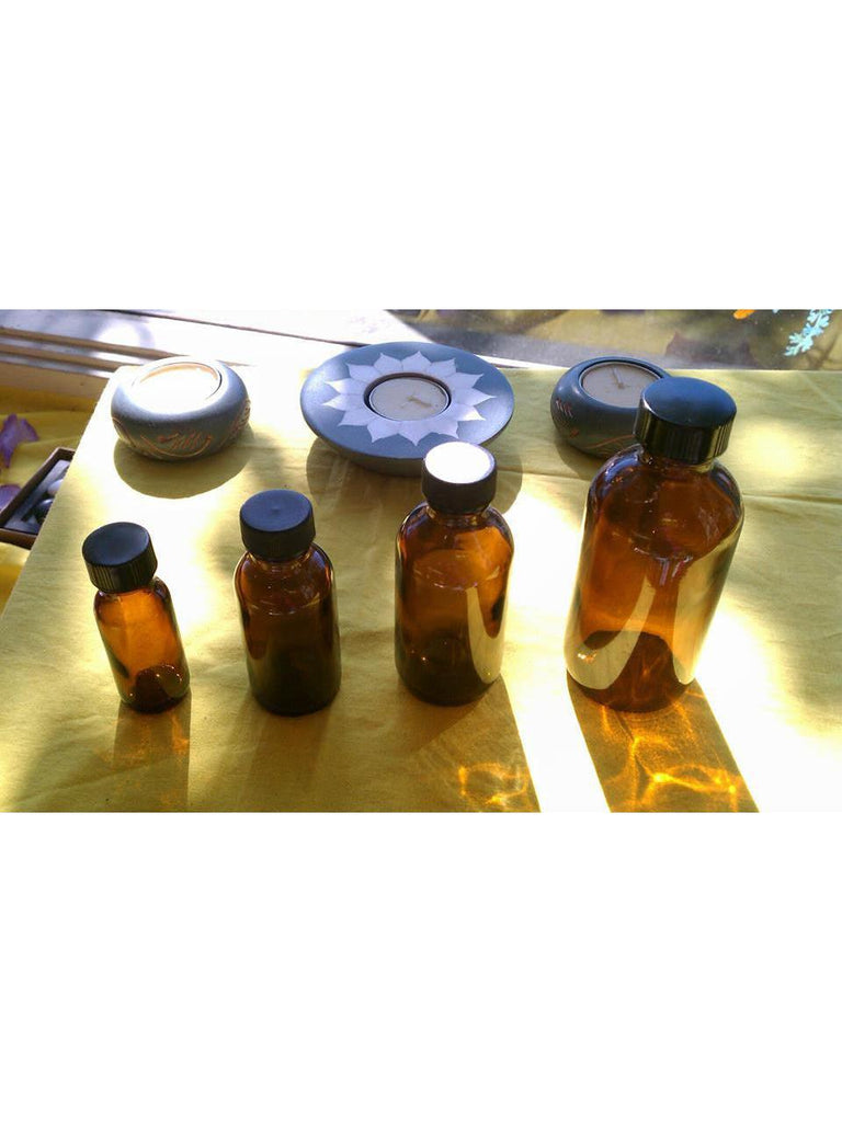 Bouteille en verre ambré avec couvercle 2oz